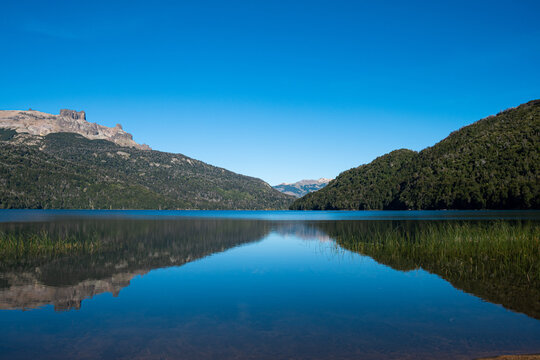 Beautiful summer landscape with lake between mountains in Argentina © Claudia Luna