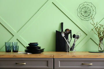 Set of clean kitchenware on counter