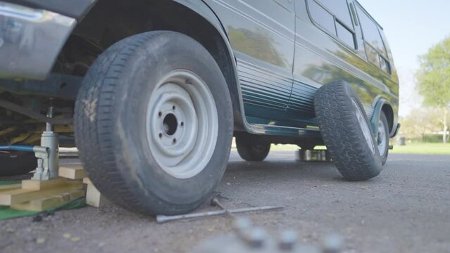 Man Changes Tire - Slow Motion
