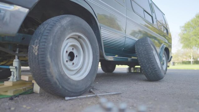 Man Changes Tire - Slow Motion