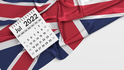 Fototapeta na wymiar White-colored July calendar page and English flag. Horizontal composition with copy space. Isolated with clipping path.