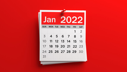 Pinned white and red-colored January 2022 calendar page. On red-colored background. Horizontal composition with copy space. Isolated with clipping path.