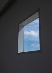 window with cloudy sky