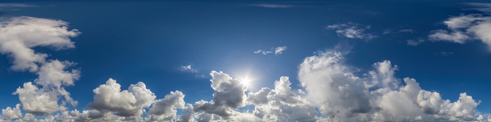 Blue sky panorama with puffy Cumulus clouds. Seamless hdr pano in spherical equirectangular format....