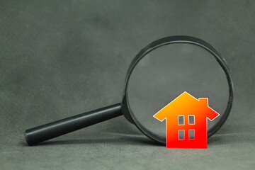 magnifying glass and house. Property inspection or home search concept