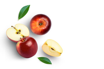 Red apple with cut in half sliced and green leaves isolated on white background. Top view. Flat lay. Copy space.