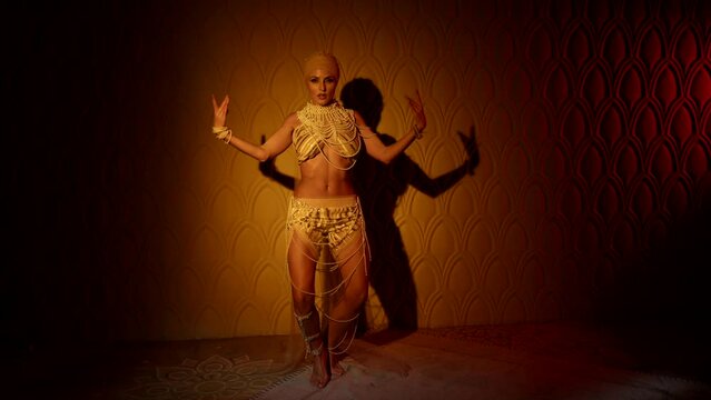 gorgeous busty lady is dancing oriental dance, belly dance show, private dance in strip club