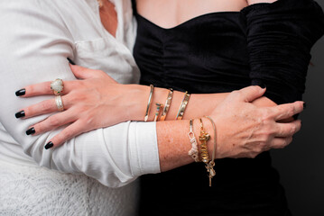  mother holds daughter's hand, mother's day photo