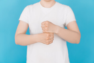 Teacher shows the word work in gestures.