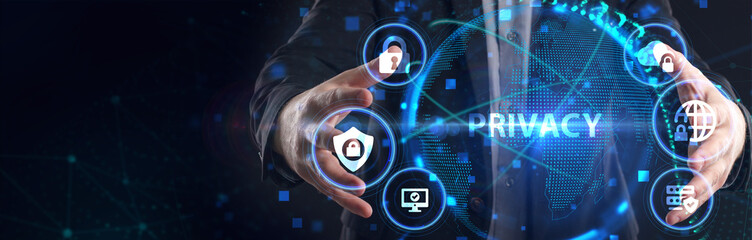 Cyber security data protection business technology privacy concept. Young businessman  select the icon Privacy on the virtual display.