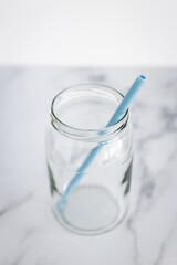 upcycled glass jar with silicon straws instead of plastic container and straws, zero waste and environmentally conscious choices