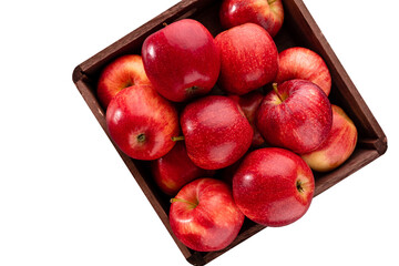 Ripe red apples in wooden box. Top view with space for your text.