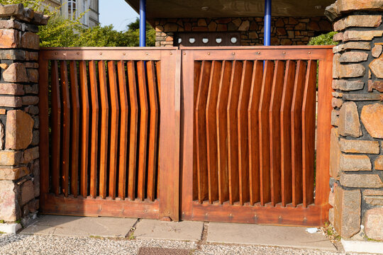 door wooden high gate design in street view outdoor home entrance