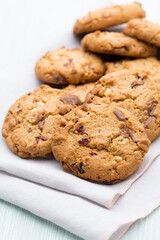 Chocolate oatmeal cookies on the  wooden background.