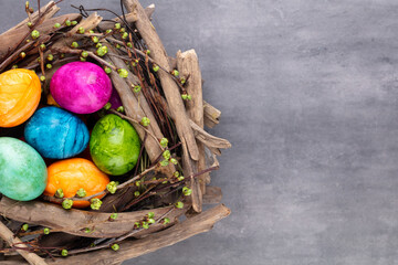 Easter eggs in the nest. Spring greeting card.