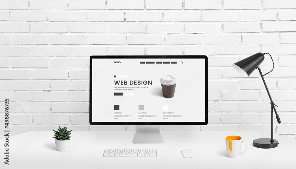Aufkleber Web design studio composition with computer display and concept web page on work desk