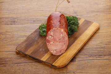 Pork ham sausage over board