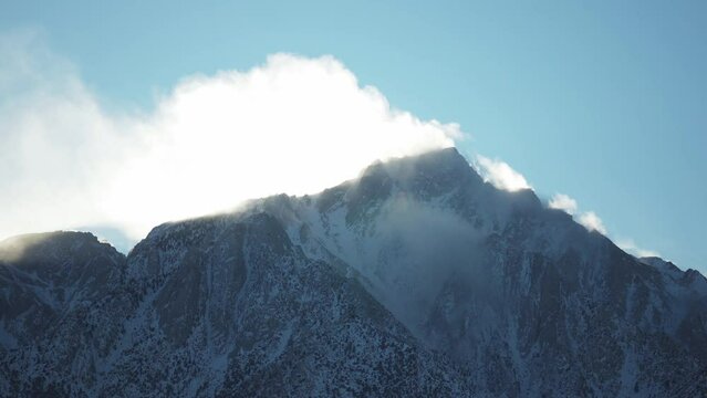 Wind blowing on a snowy mountain peak, Eastern Sierra Nevada, California