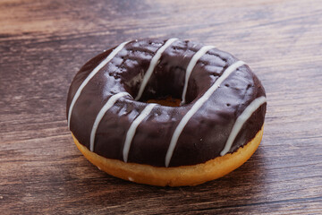 Glazed sweet tasty chocolate donut