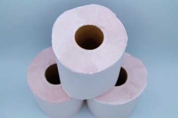 ホワイトバックのピンクのトイレットペパー