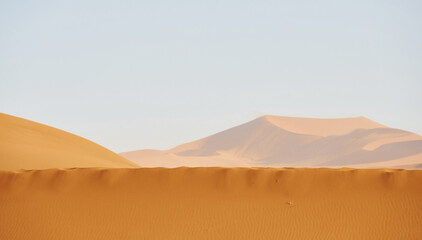 Fototapeta na wymiar Colder colored sand. Majestic view of amazing landscapes in African desert