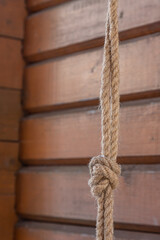 Bow knot made of linen rope string isolated over the background