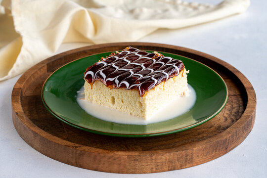 Caramel trilece cake. Trilece cake on a white background. . Bakery products. Close-up. local name trile&ccedil;e pasta