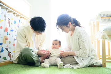 And for the main visual! Family relaxing in a child's room Backlit