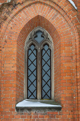 a fragment of the facade of a historic neo-Gothic church