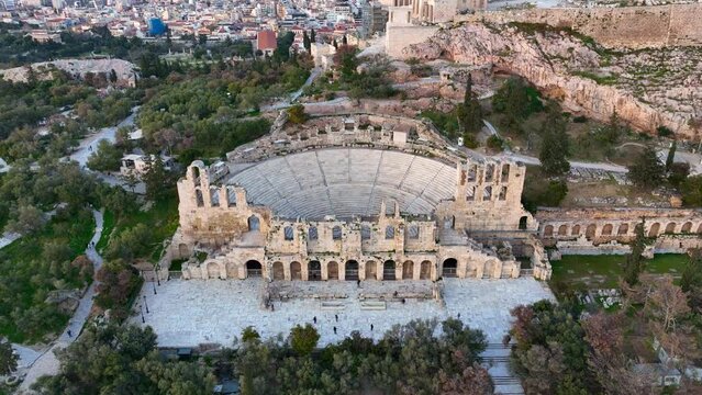 ancient amphitheater in Athens at sunrise, Greece tourism, unesco heritage in Greece, aerial view f Greek landmark, monument of Ancient Greek civilisation, 