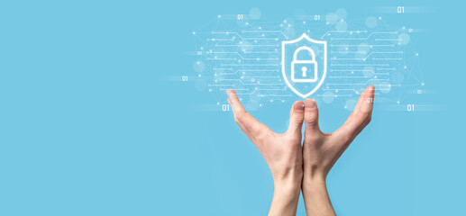 Protection network security computer and safe your data concept, Businessman holding shield protect icon. lock symbol, concept about security, cybersecurity and protection against dangers