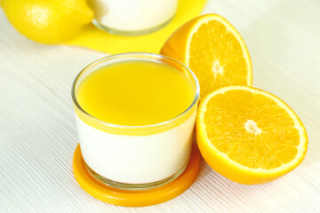 Panna cotta citrus with orange and lemon. Milky creamy sweet fruit dessert blancmange. Healthy food