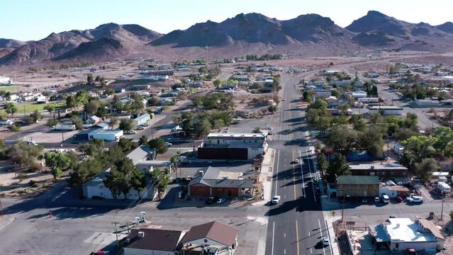 Aerial cityscape of a small town in the middle of desert on a hot day. Beatty, Nevada