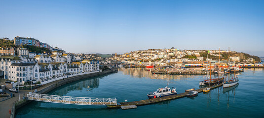 Fototapeta premium Sunrise over Brixham Marina and Harbour from a drone, Brixam, Devon, England, Europe