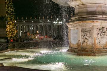 St. Peter's Square for the holidays on a rainy evening, Italy