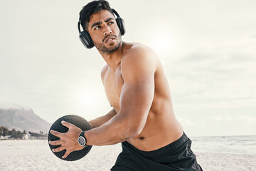 Music and exercise, now thats a good combination. Shot of a sporty young man wearing headphones...