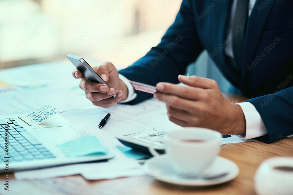 Poster its the quick and convenient way to process payments. shot of an unidentifiable businessman making a