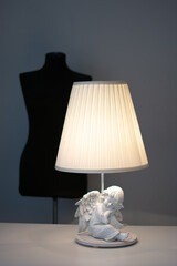 handmade floor lamp with an angel in the interior