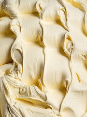 Vanila flavour gelato - full frame detail. Close up of a beige surface texture of vanilla Ice cream.