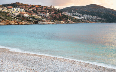 Kalkan,Antalya,Turkey beach,sunset in town,coastline.Beautiful turquoise sea, empty seaside.Breathtaking view,copy space