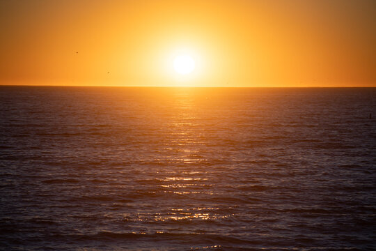 Calm sunset at the sea. landscape with sunset over the ocean. Calm sea. Panorama on sea at sunset. Beautiful seascape. Composition of nature.