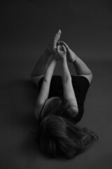 details of the dancer's body, feet during the dance, fuzzy and blurred film photography