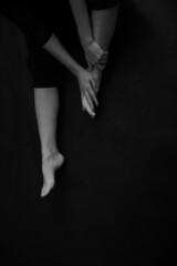 details of the dancer's body, feet during the dance, fuzzy and blurred film photography