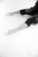 details of the dancer's body, feet during the dance, fuzzy and blurred film photography