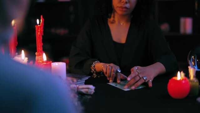 Client giving photo to mysterious witch, magic ritual to put spell on person