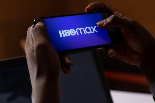 Auchi, Edo-Nigeria-June 12, 2021: black person streaming content on hbo max