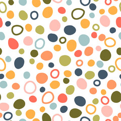 Multicolored spots circles vector seamless pattern. Seamless background with modern rainbow dots. Texture of colorful shapes for fabric, wrapping paper, scrapbooking.