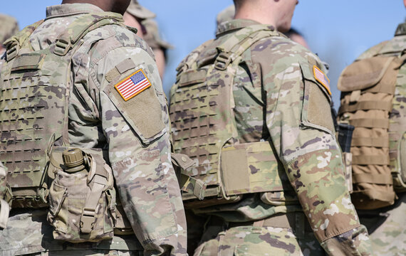 Detail View Of The US Army Uniform Worn By Soldiers In A Military Base. Flag Of America On The Uniform.