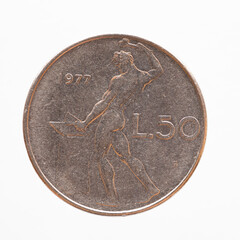 Italy - circa 1964: a 50 lire coin of Italy showing the allegorical depiction of a blacksmith at...