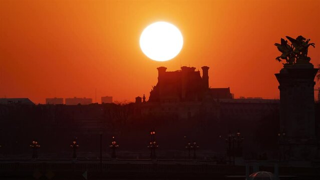 Paris, France, Timelapse - Close up clip of the Louvre musuem and the Pont Alexandre III during the sunrise